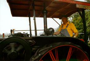 Charlie in the cab of his 25-40 Rumely Oil Pull Tracator