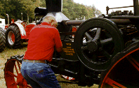 Hobart Morgan starting up the old Rumely.