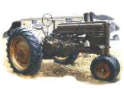 Unrestored 1941 styled hand-crank John Deere A (Side View)