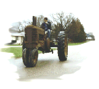 Burnin' up the road on my 1st Antique Tractor